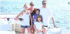 Family posing on boat